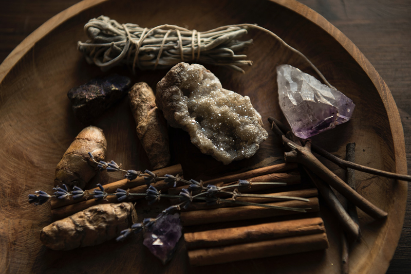Ritual or prayer bowl contents of crystals, spices, herbs, wood, etc. – Joanna Kosinska on Unsplash
